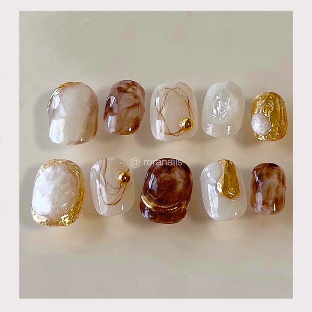 Irregular white jade gold edge - roranails