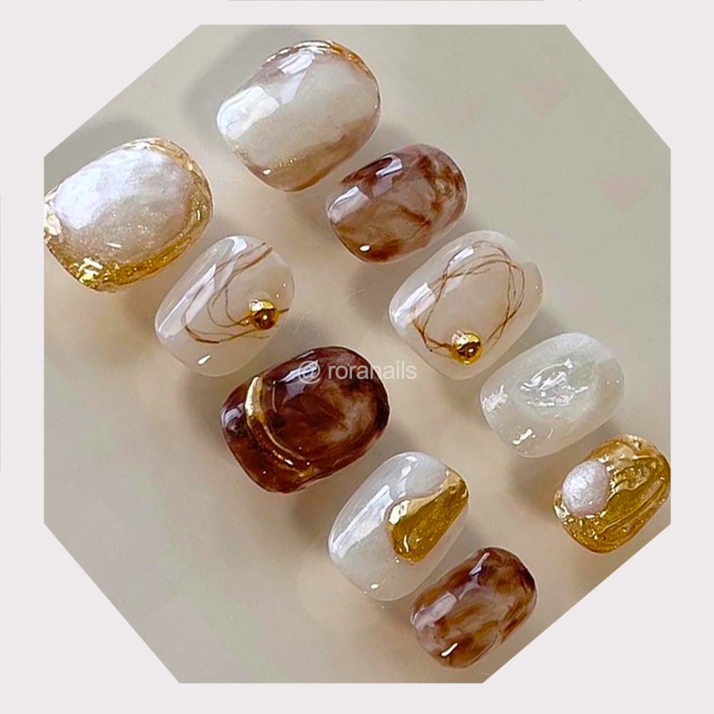 Irregular white jade gold edge - roranails